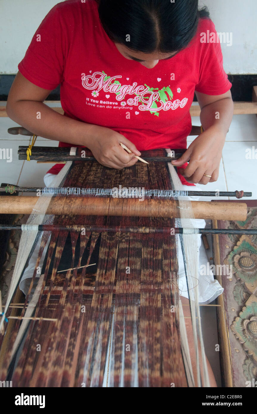 Woman weaving in Bali Indonesia Stock Photo Alamy