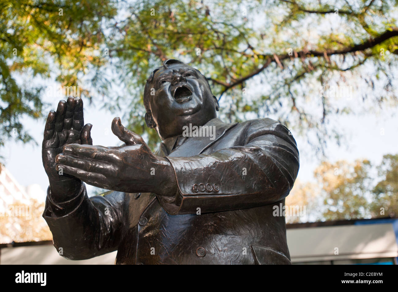 Metal statue of Fiorello Henry LaGuardia clapping hands, Laguardia Place, New York City, USA Stock Photo
