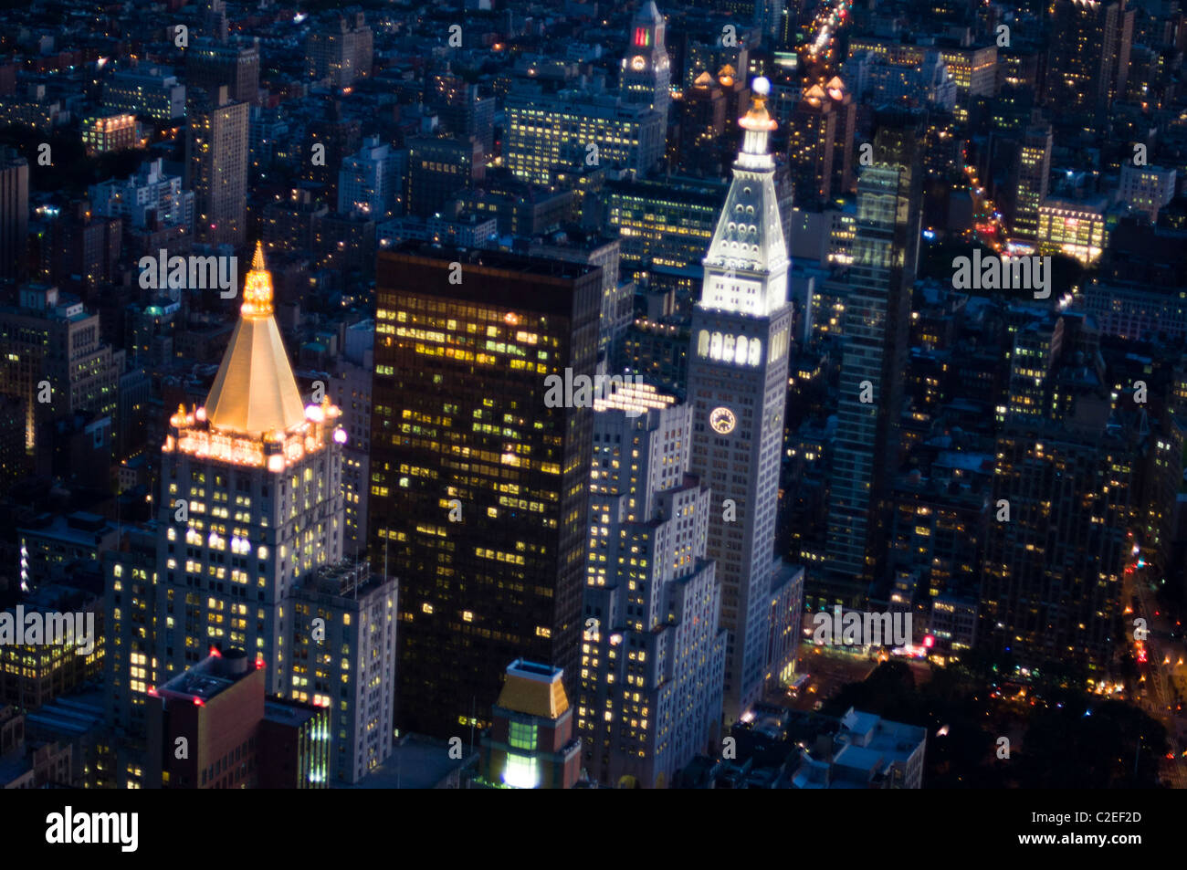 Aerial view of Manhattan by night with city lights, New York City, USA ...