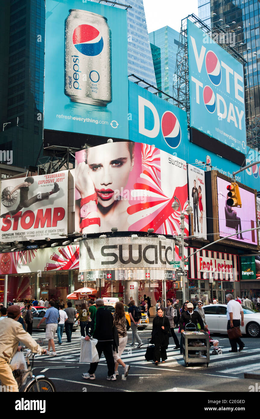 Swatch store at Times Square with big advertisements of Pepsi Cola, Manhattan, New York City, USA Stock Photo