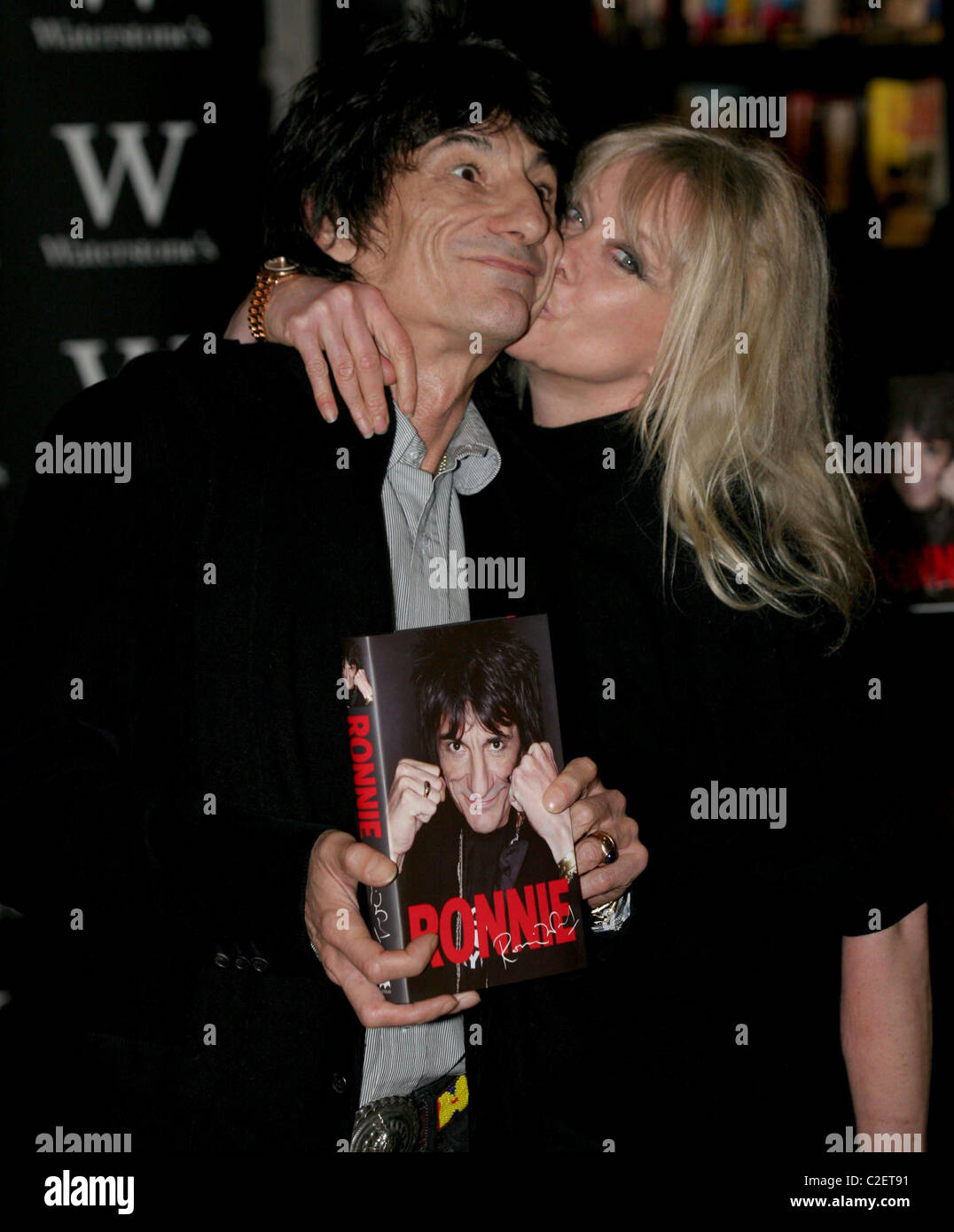 Ronnie Wood and wife Jo Wood Ronnie Wood signing copies of his