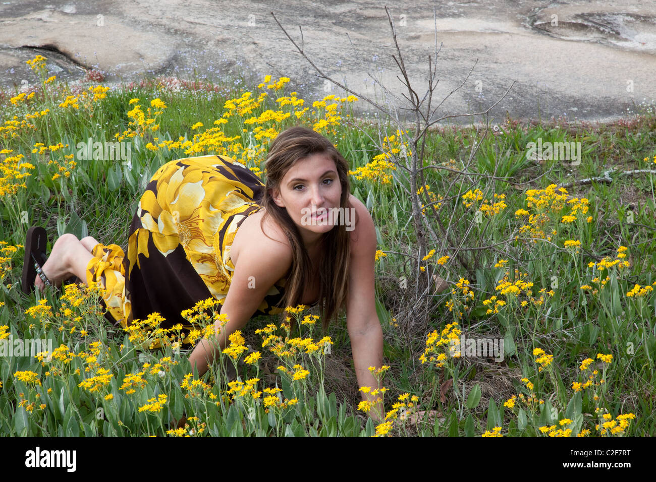 Woman in dress kneeling on hi-res stock photography and images - Alamy