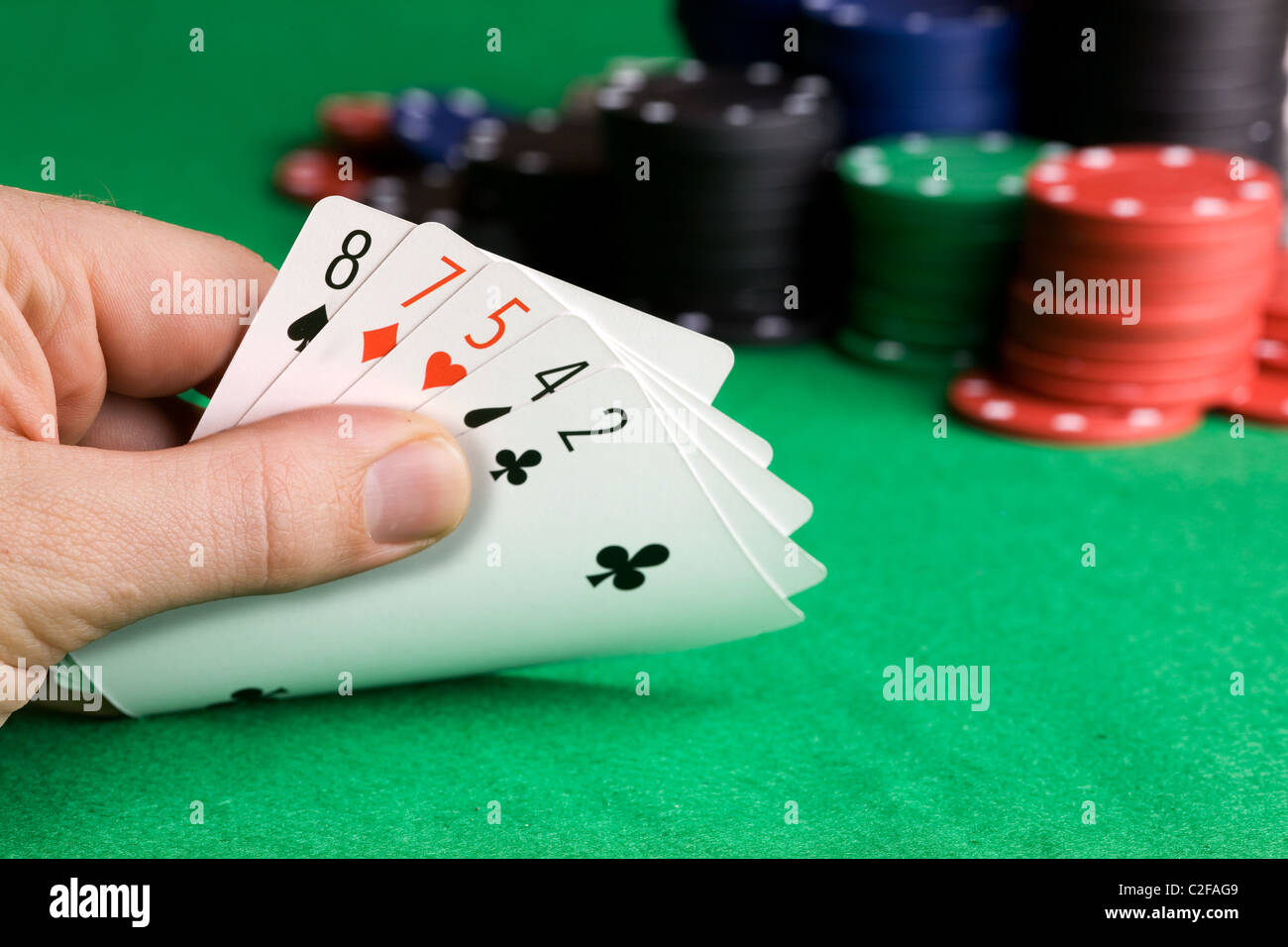Bluffing with a poor poker hand Stock Photo Alamy