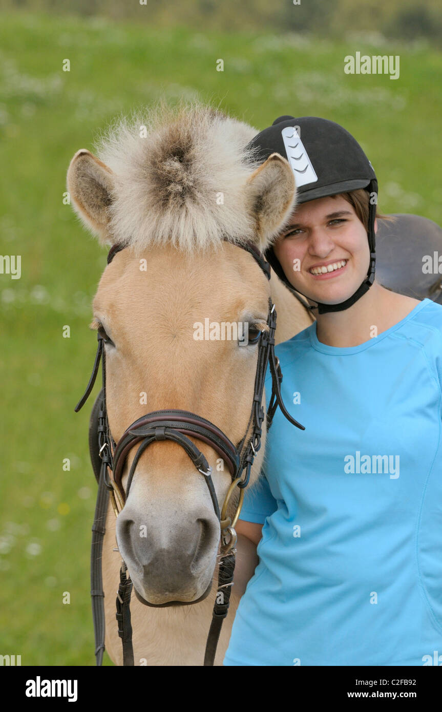 Girl and Norwegian horse Stock Photo Alamy