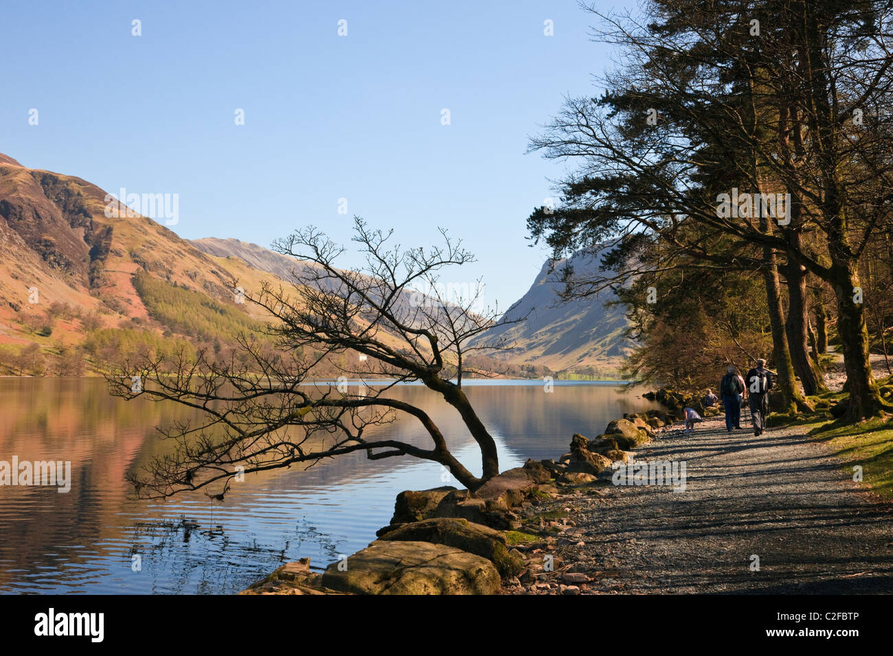 Lakeside path beside Buttermere Lake in the Lake District National Park. Buttermere, Cumbria, England, UK, Britain Stock Photo