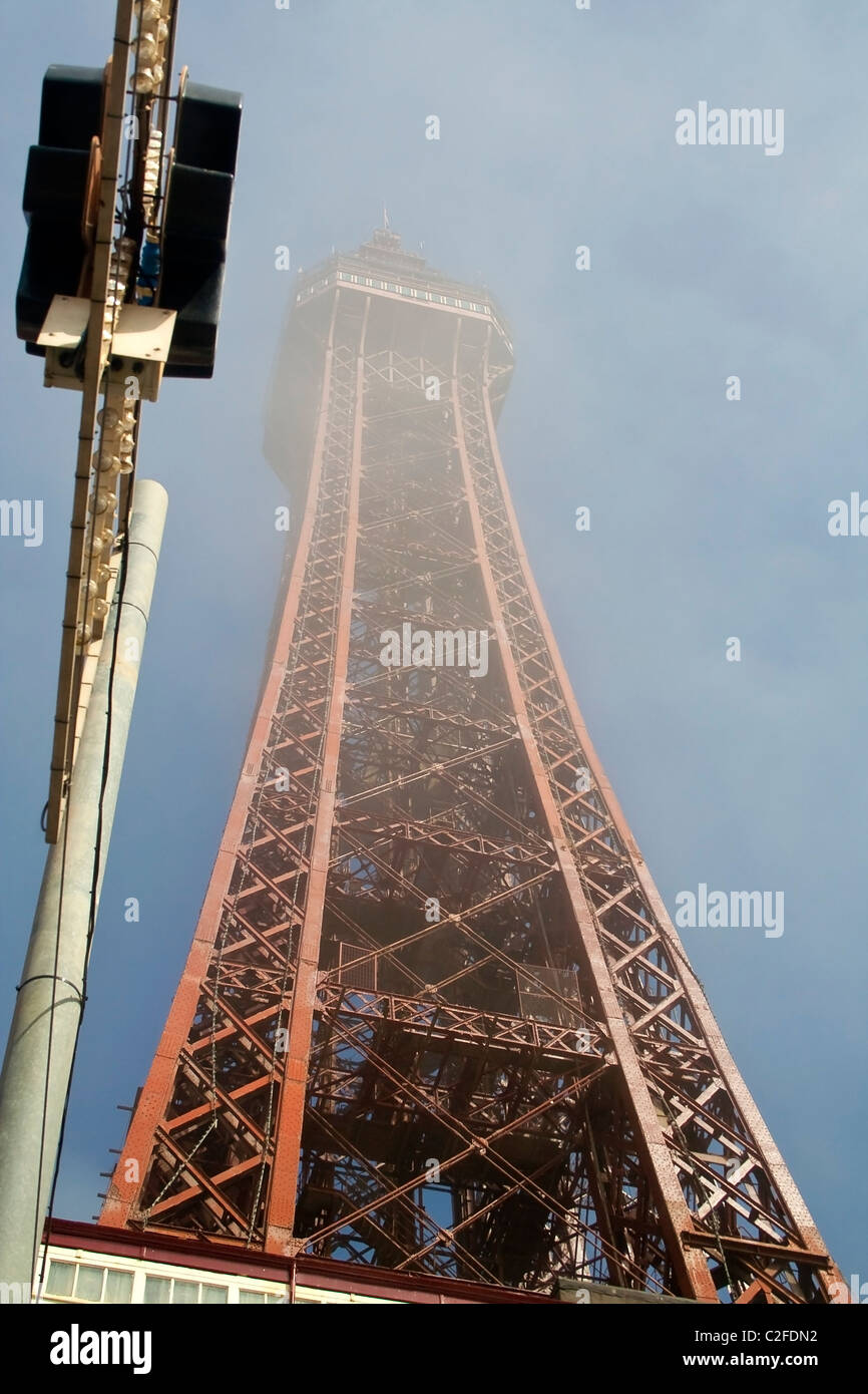 A worms eye view of Blackpool tower rising into the mist Stock Photo