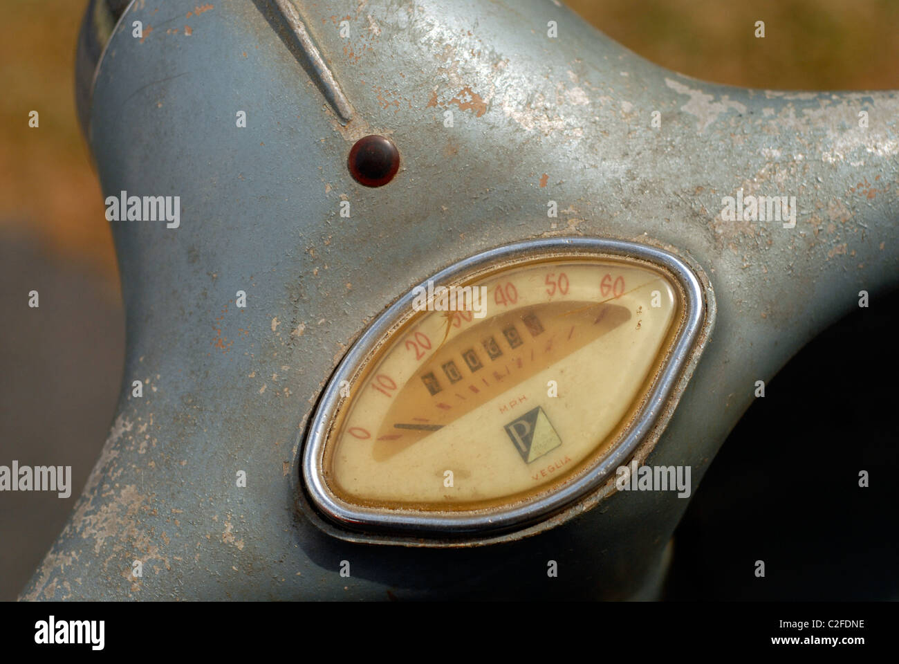 Vintage Vespa speedometer and headset. 1960 Vespa 150 VBA motorscooter. Stock Photo
