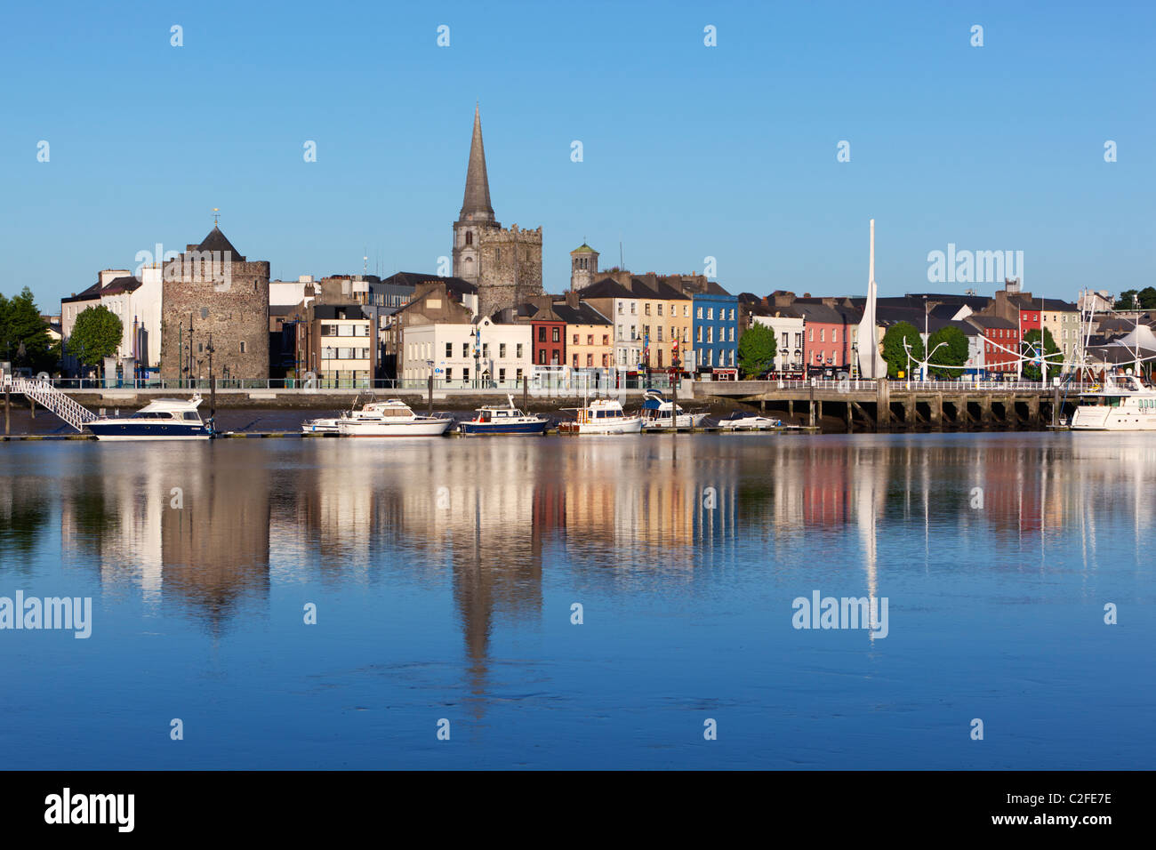 View over River Suir to Reginald's Tower, Holy Trinity and Christ Church Cathedrals Stock Photo