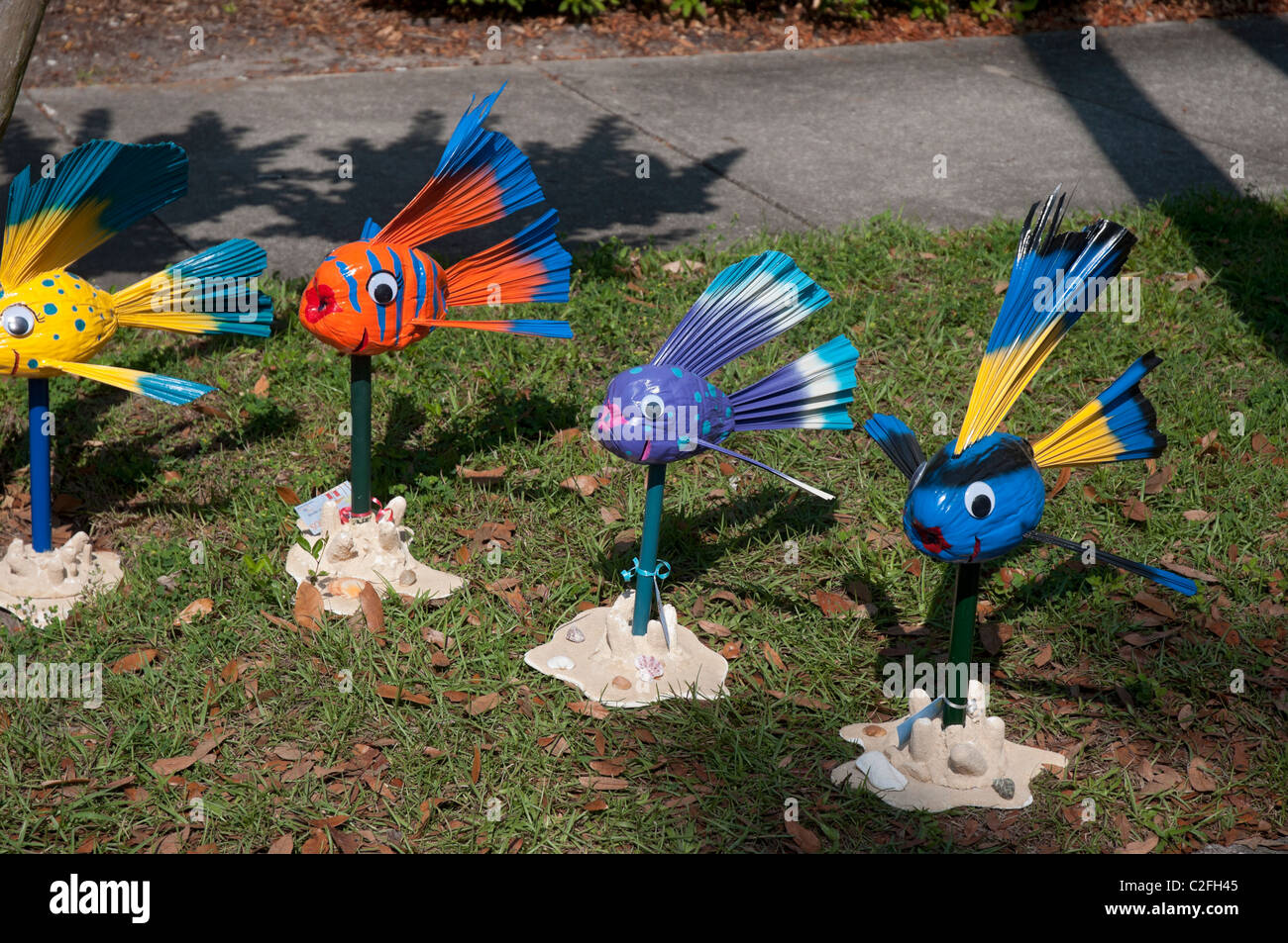 kitschy items made from painted coconuts on sale at the Spring Arts