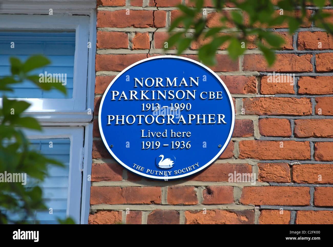 putney society blue plaque marking a home of fashion photographer norman parkinson, in landford