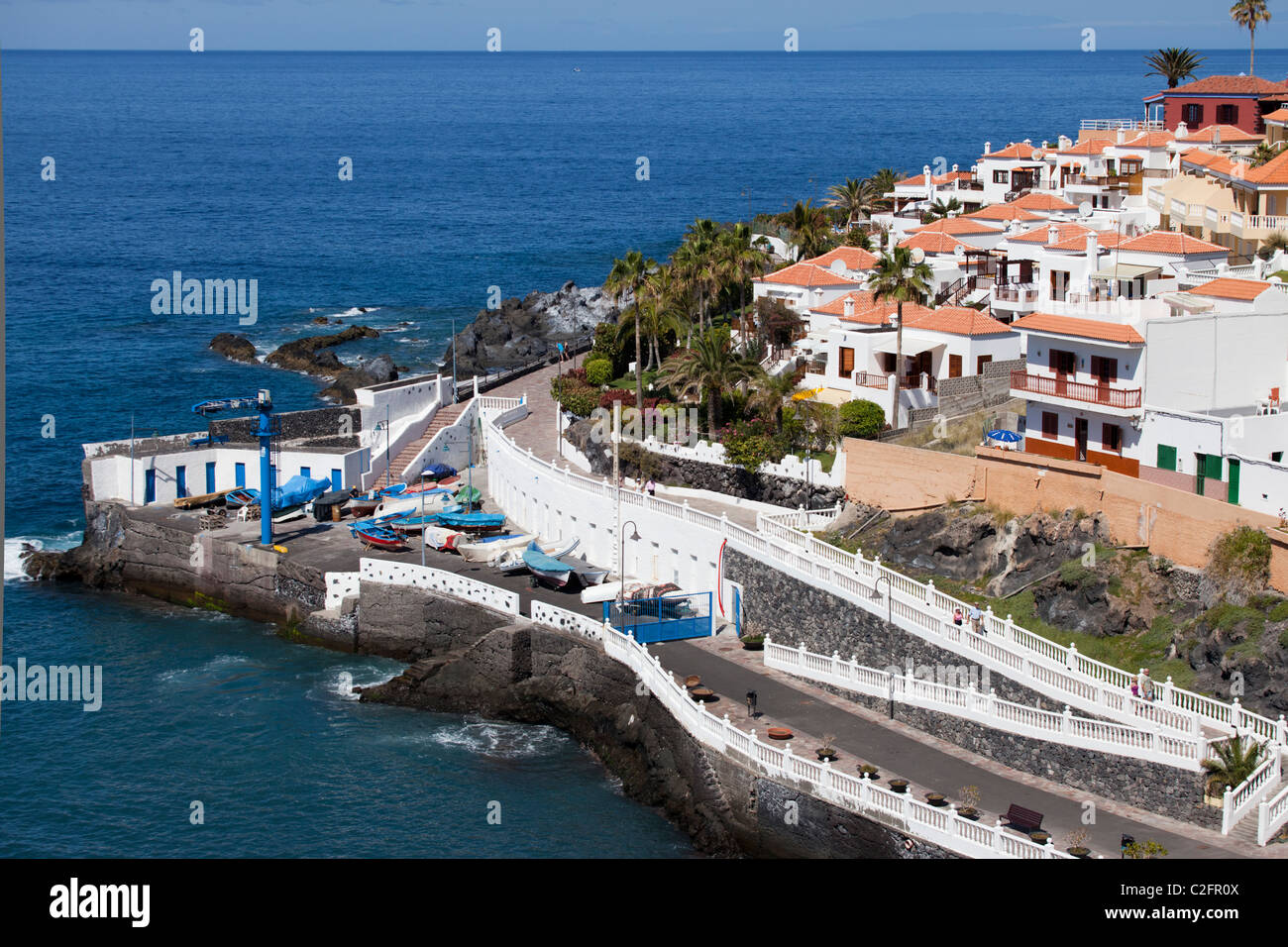 Holiday apartments and the harbour at Puerto Santiago, Tenerife Stock Photo