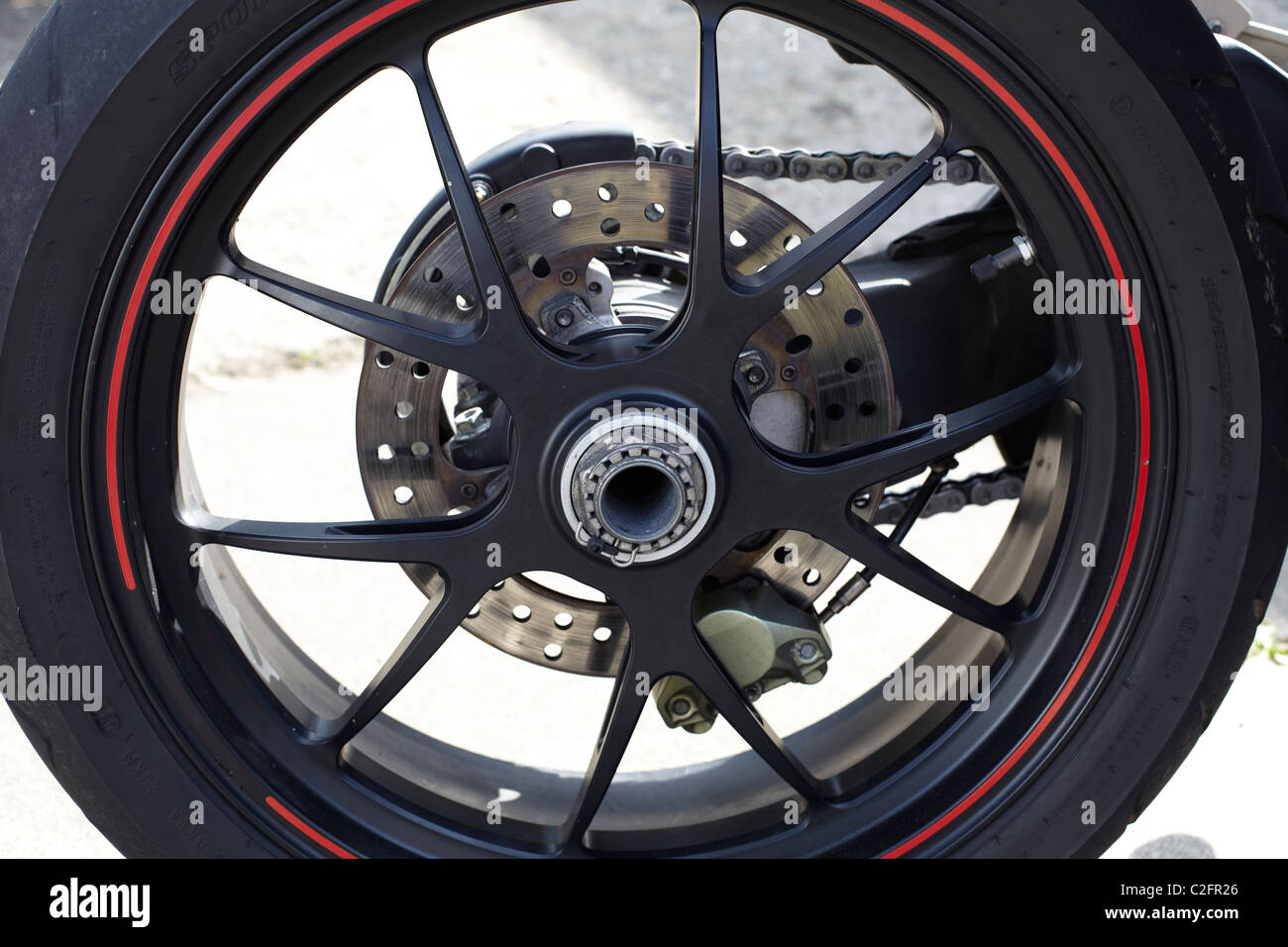 ducati hypermotard 1100 rear wheel detail Stock Photo Alamy