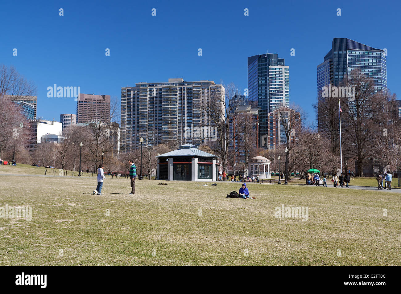 People enjoying Boston Common, the oldest city park in the US. Modern ...