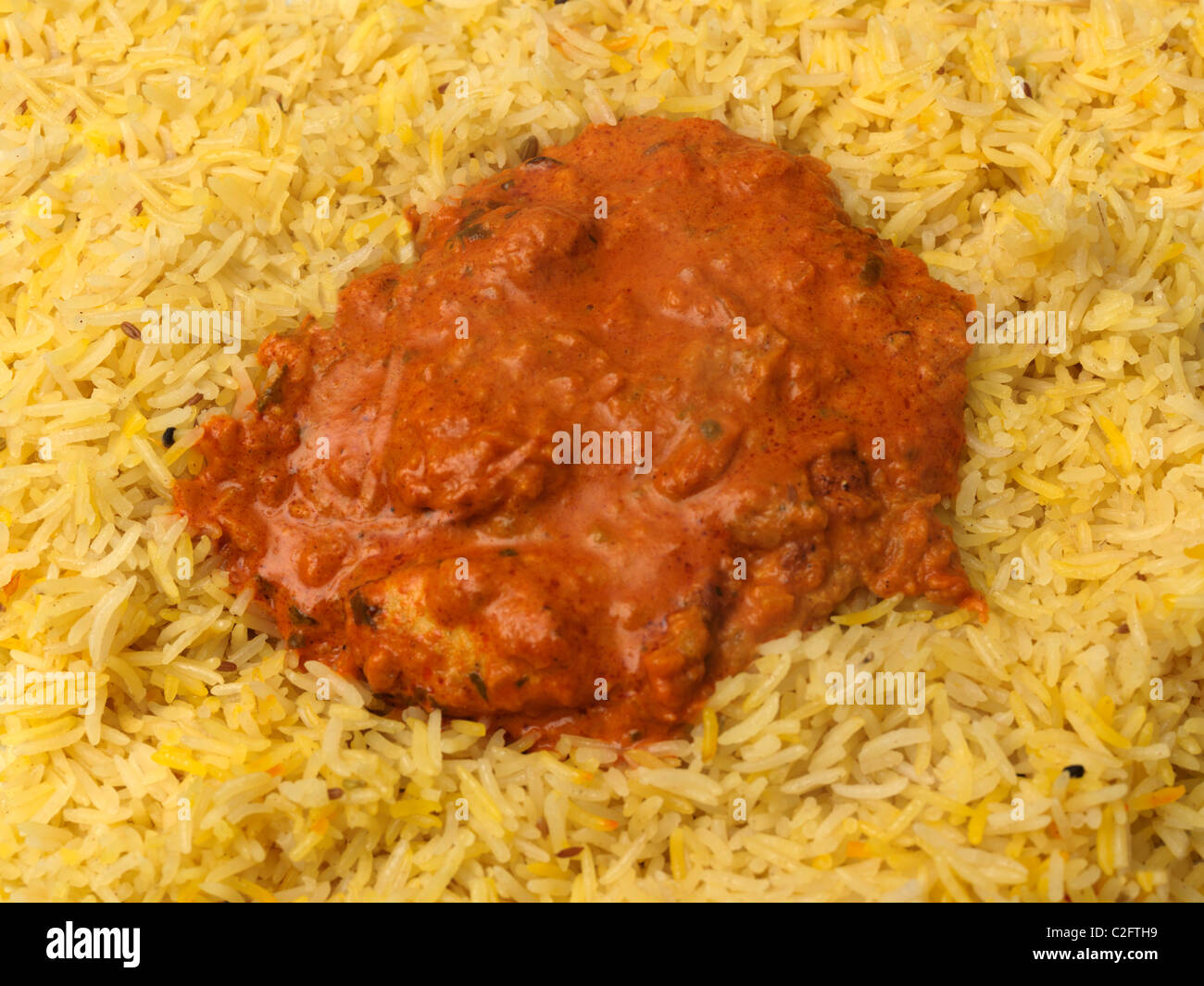 Chicken Tikka Masala And Pilau Rice Stock Photo