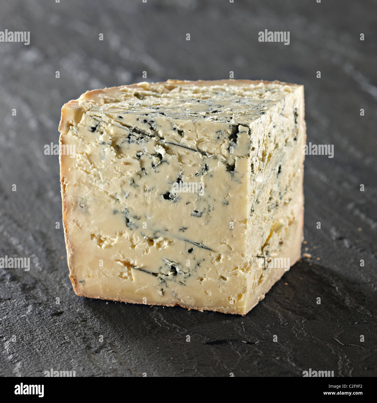 Neals yard stilton cheese wedge Stock Photo