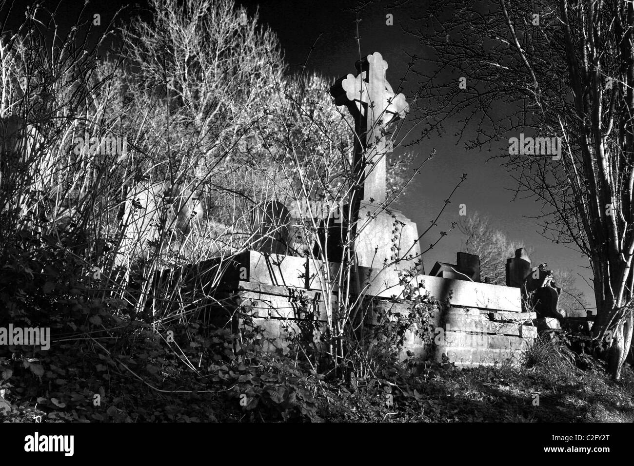 Grave stones and monuments in old church yard. Stock Photo