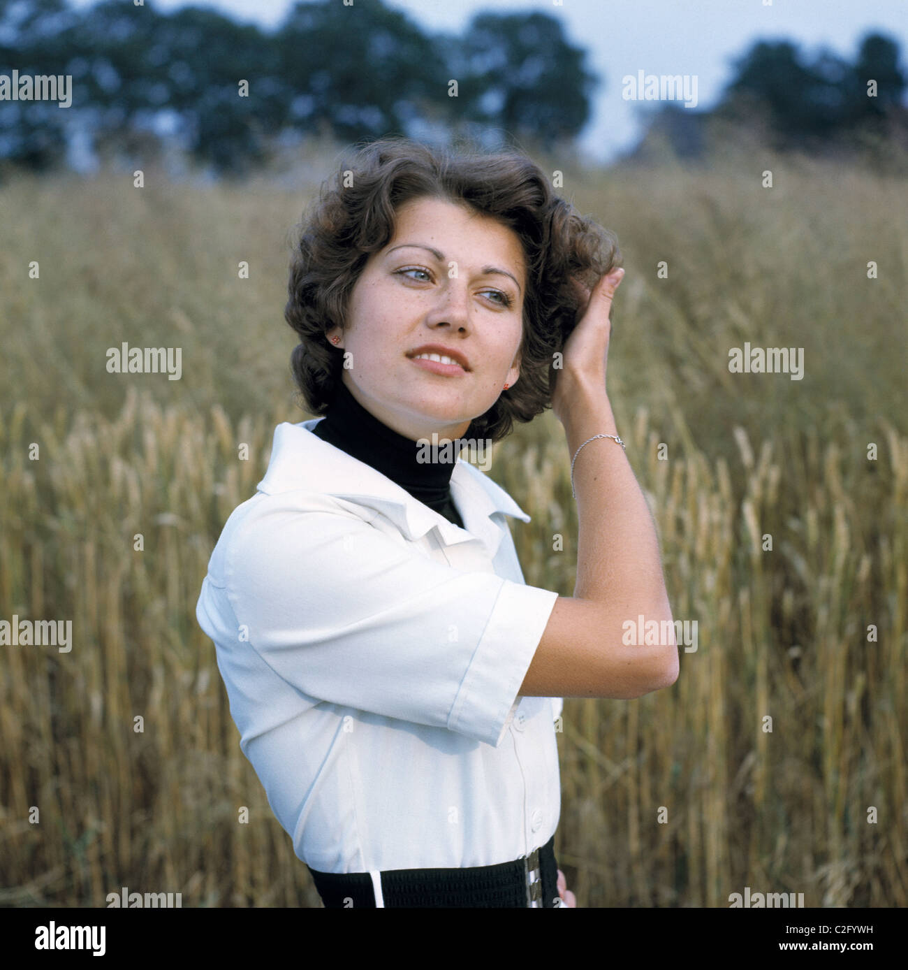 Siebziger Jahre, Menschen, junge Frau, Portraet, mittellanges Haar, Locken Stock Photo