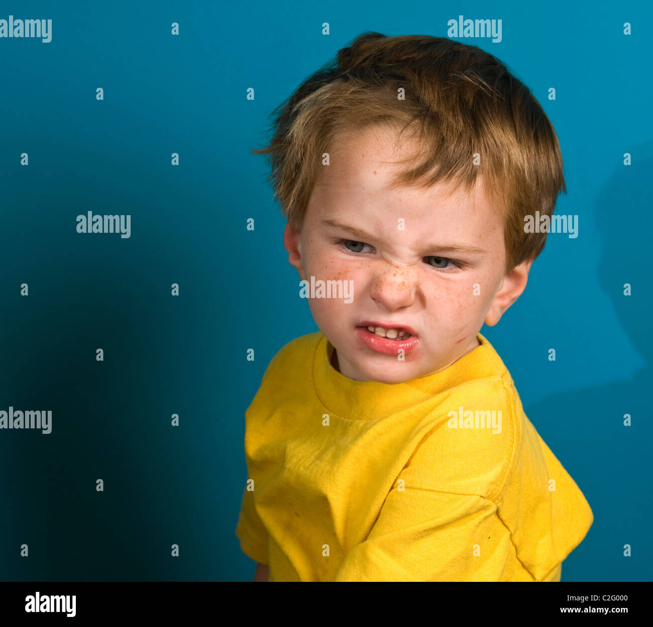 An annoyed 2 year old boy, Stock Photo
