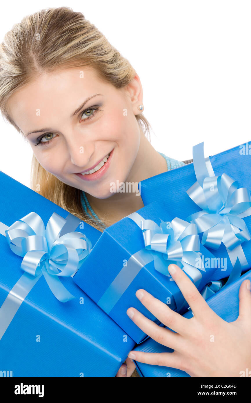 Young happy woman hold blue present with ribbon Stock Photo - Alamy