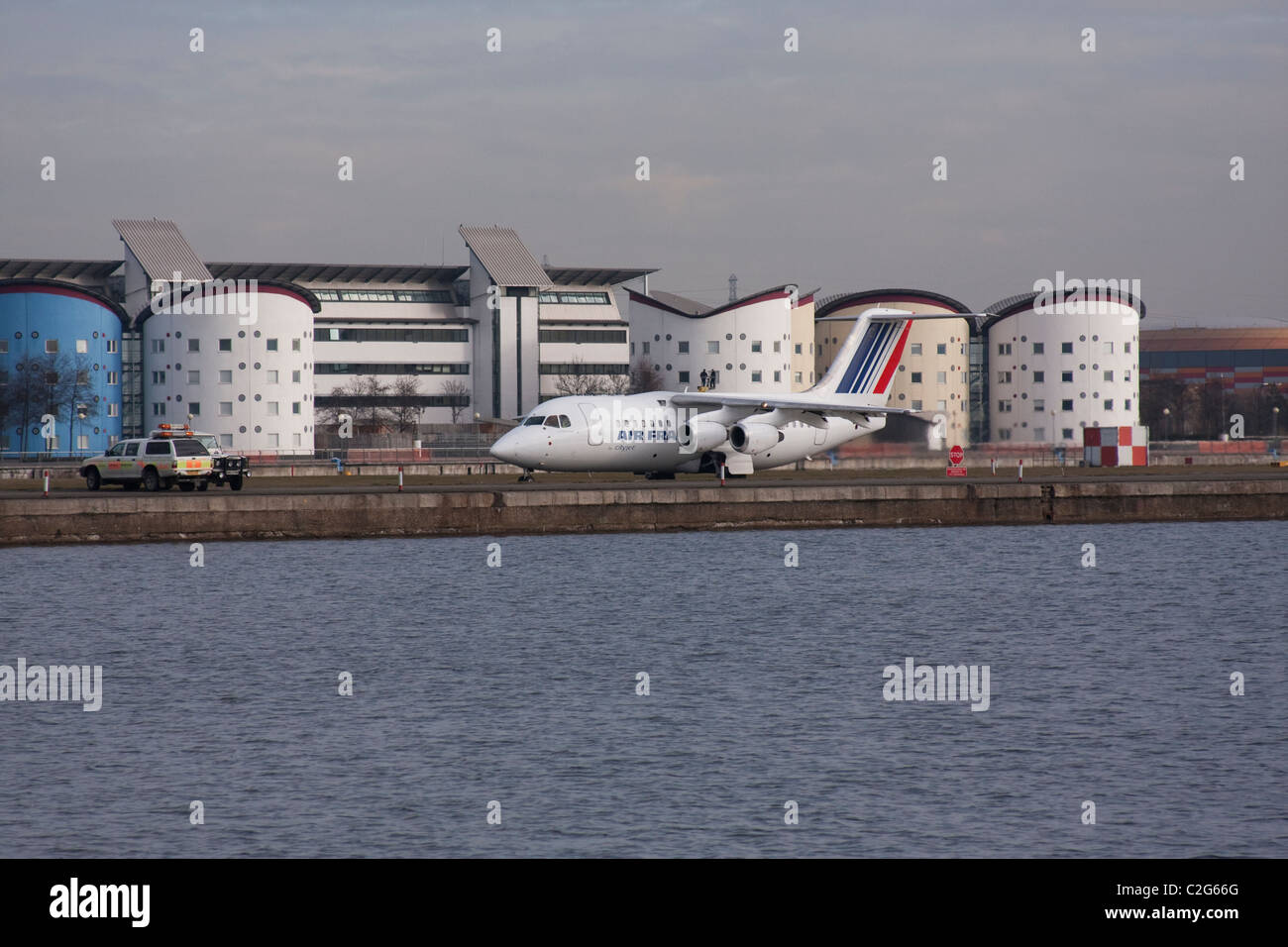 Plane landing at London City Airport Stock Photo