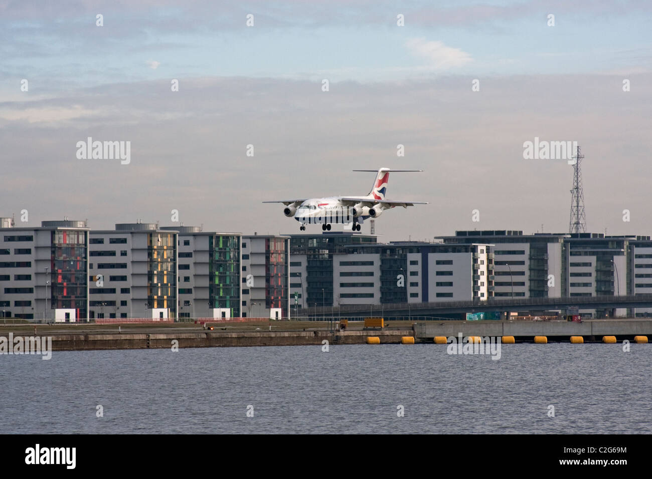 Plane landing at London City Airport Stock Photo
