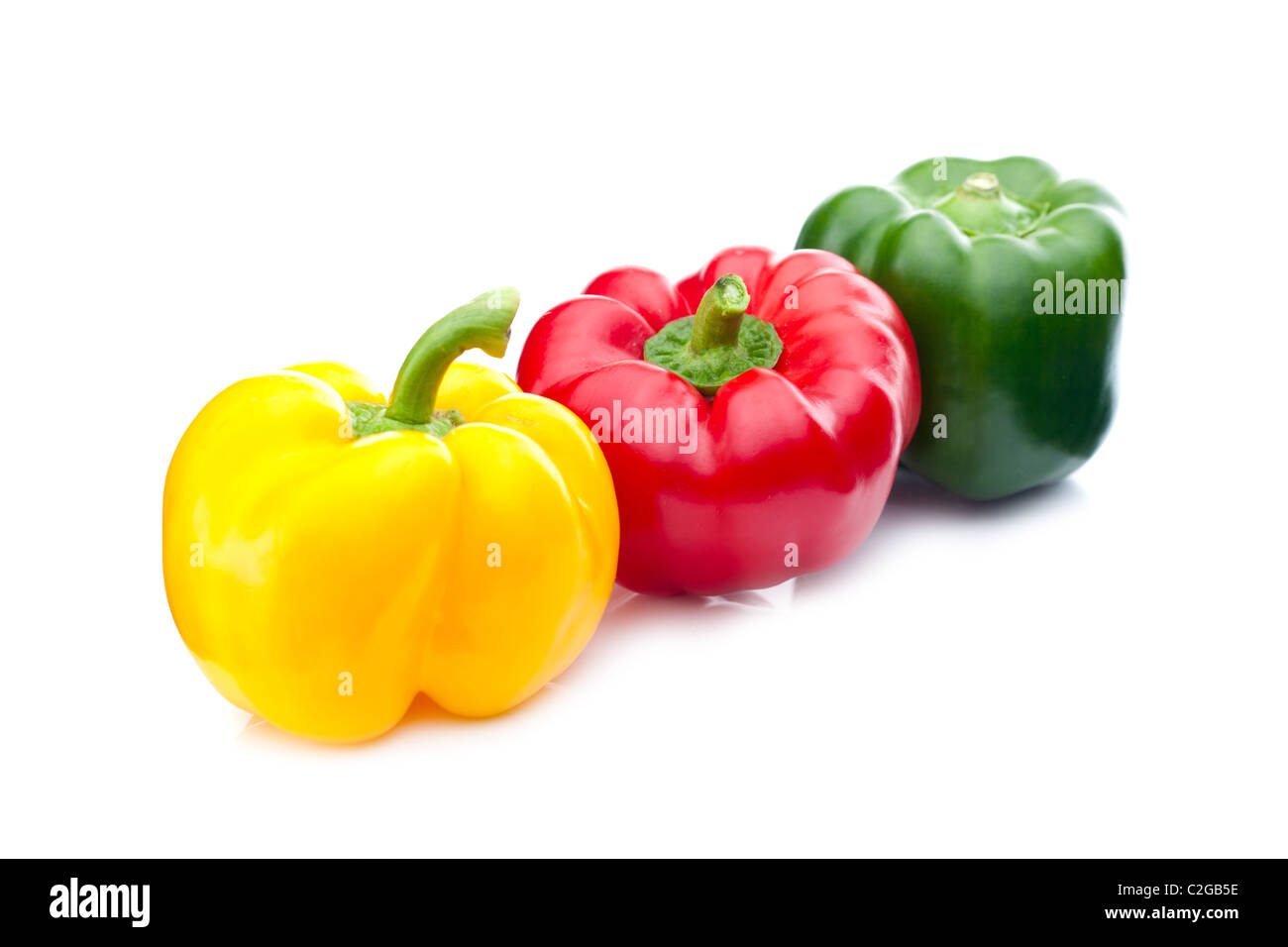 Isolated sweet yellow bell pepper (Capsicum annuum) on white background. Stock Photo