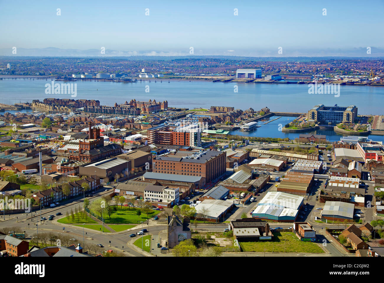 An aerial view of the city centre of Liverpool looking across the marina towards Camel Lairds. Stock Photo