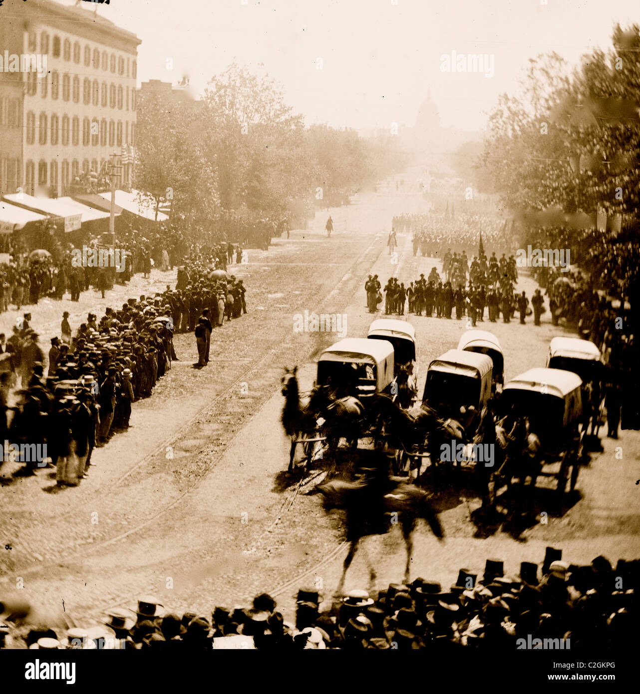 Washington, D.C. Group of ambulances followed by band and infantry units on Pennsylvania Avenue near the Treasury Stock Photo
