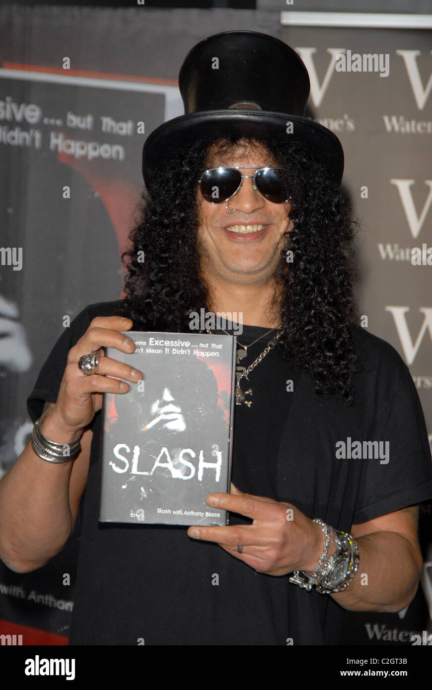 Former Guns N' Roses guitarist Slash signs copies of his autobiography ' Slash' at Waterstone's in Piccadilly, London Stock Photo - Alamy