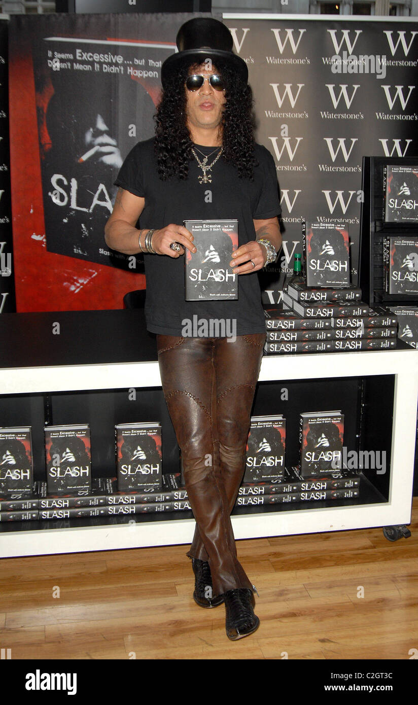 Former Guns N' Roses guitarist Slash signs copies of his autobiography ' Slash' at Waterstone's in Piccadilly, London Stock Photo - Alamy