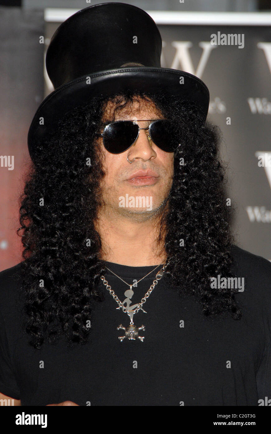 Former Guns N' Roses guitarist Slash signs copies of his autobiography ' Slash' at Waterstone's in Piccadilly, London Stock Photo - Alamy