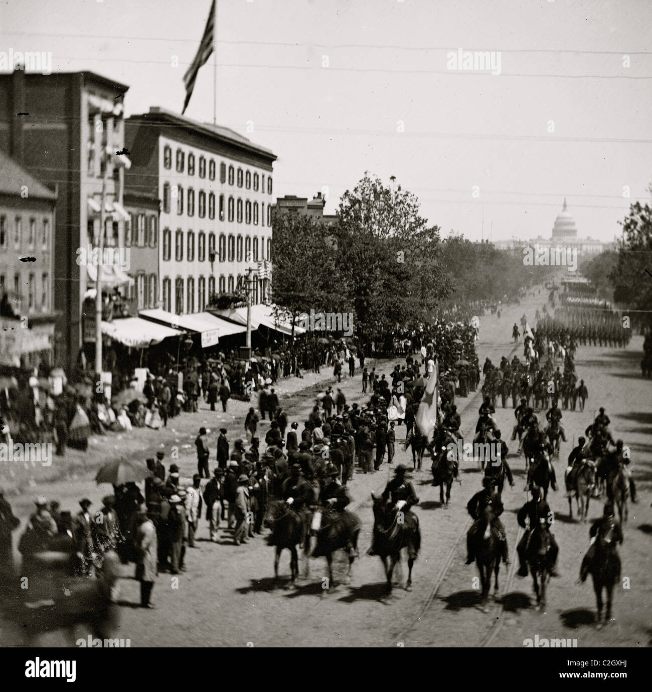 Washington, District of Columbia. Grand Review of the Army [Cavalry] and infantry passing on Pennsylvania Avenue near the Treasury Stock Photo