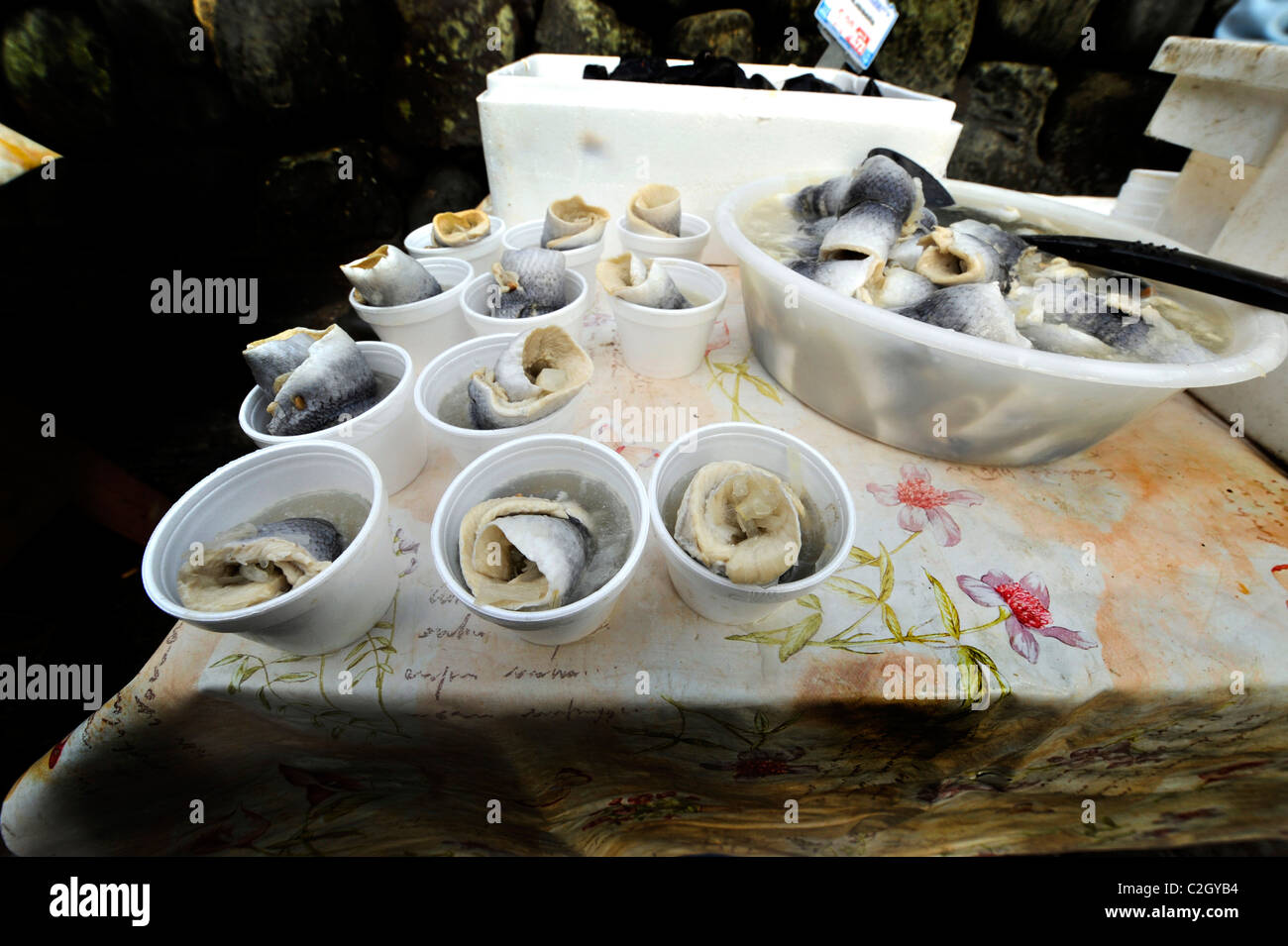 rollmop herring for sale at the annual herring festival in historic fishing village of Clovelly