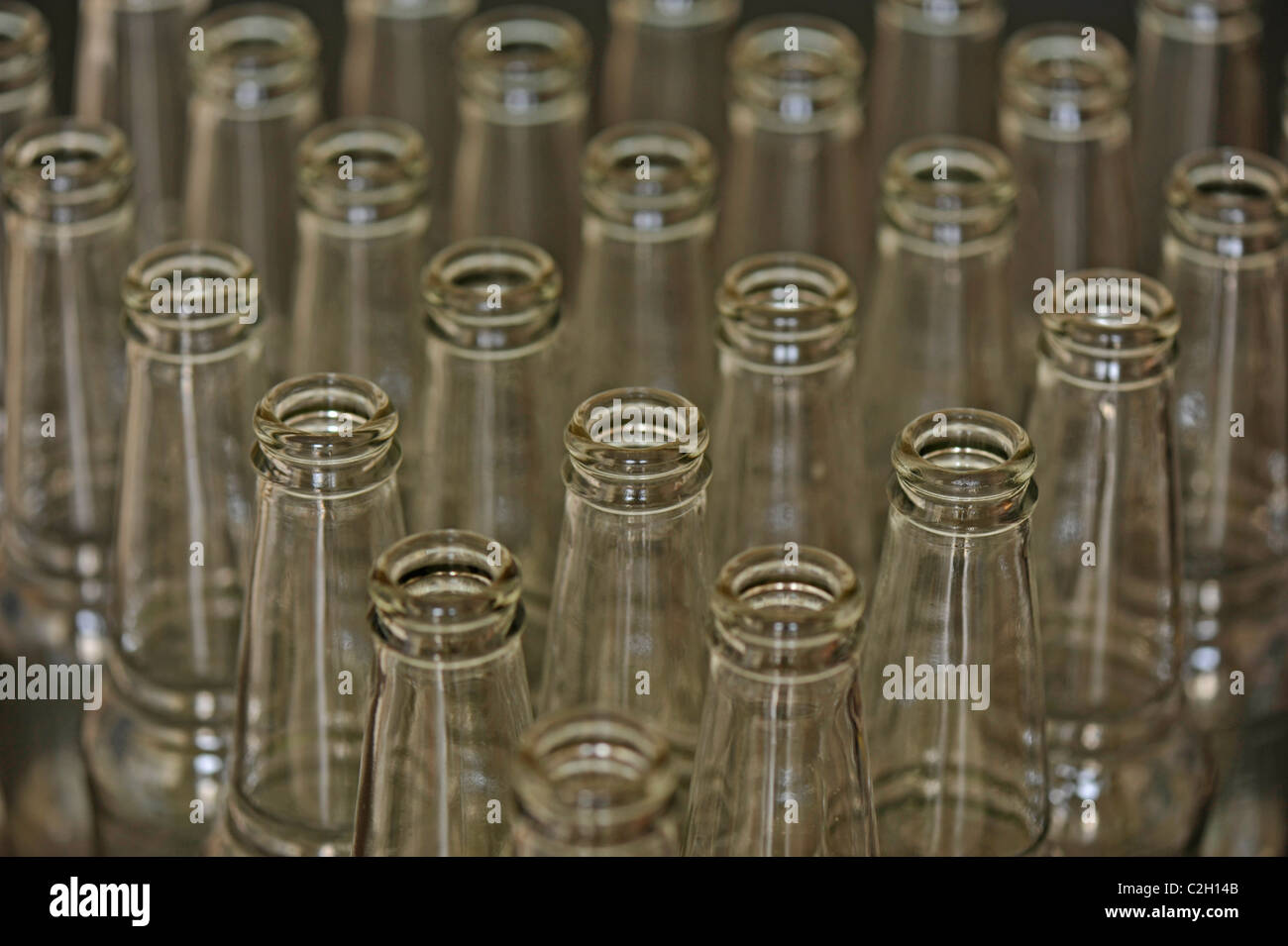 Close-up of a group of empty clear-glass bottles Stock Photo