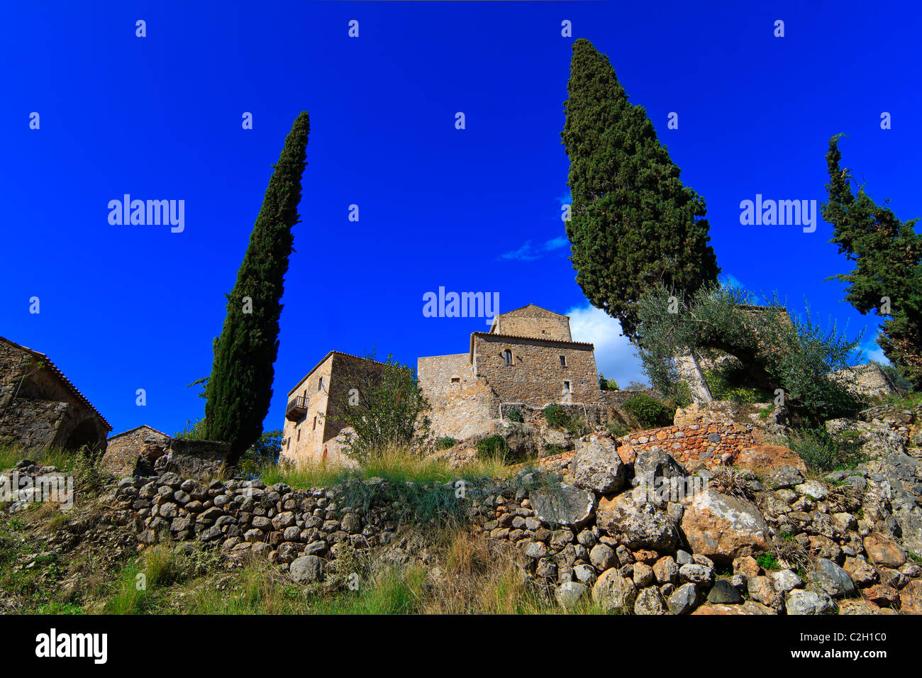 Typical stone Tower-houses ruins in Mani, Greece Stock Photo