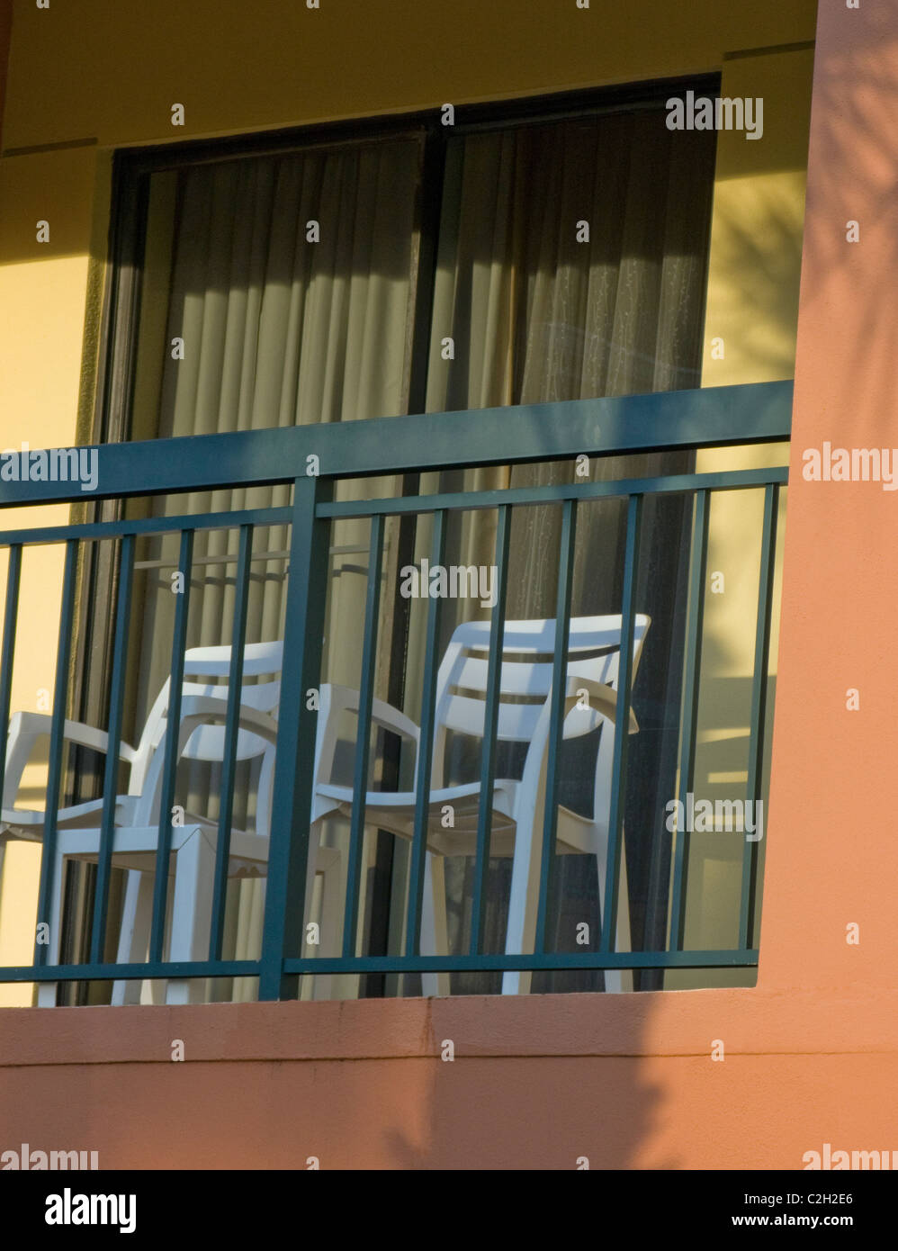 PLASTIC CHAIRS ON A HOTEL BALCONY IN FLORIDA Stock Photo - Alamy