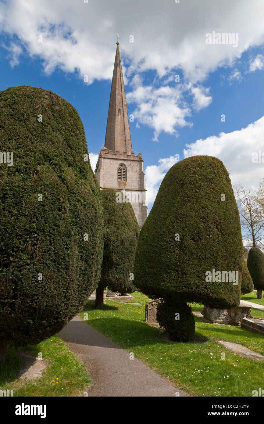 PAINSWICK CHURCH AND CHURCH YARD WITH YEW TREES IN THE COTSWOLDS UK Stock Photo