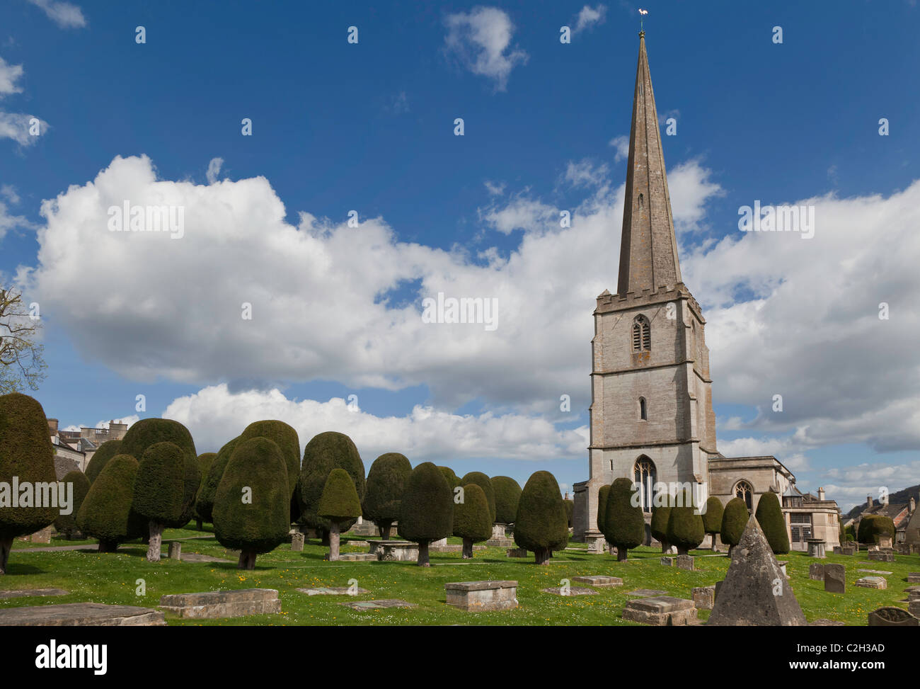 PAINSWICK  CHURCH AND CHURCH YARD WITH YEW TREES IN THE COTSWOLDS, GLOUCESTERSHIRE, ENGLAND UK Stock Photo