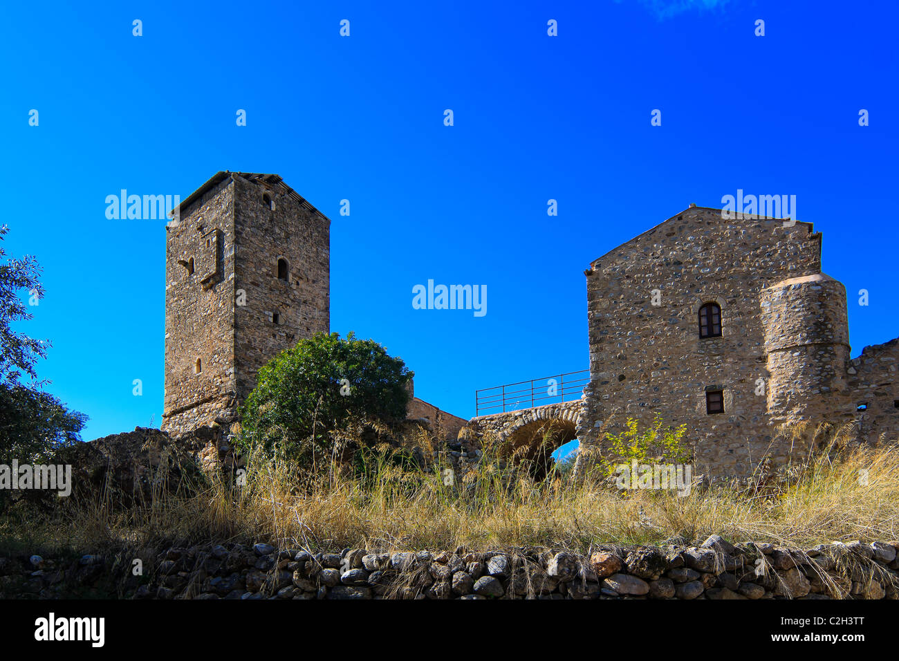 Typical stone Tower-houses ruins in Mani, Greece Stock Photo