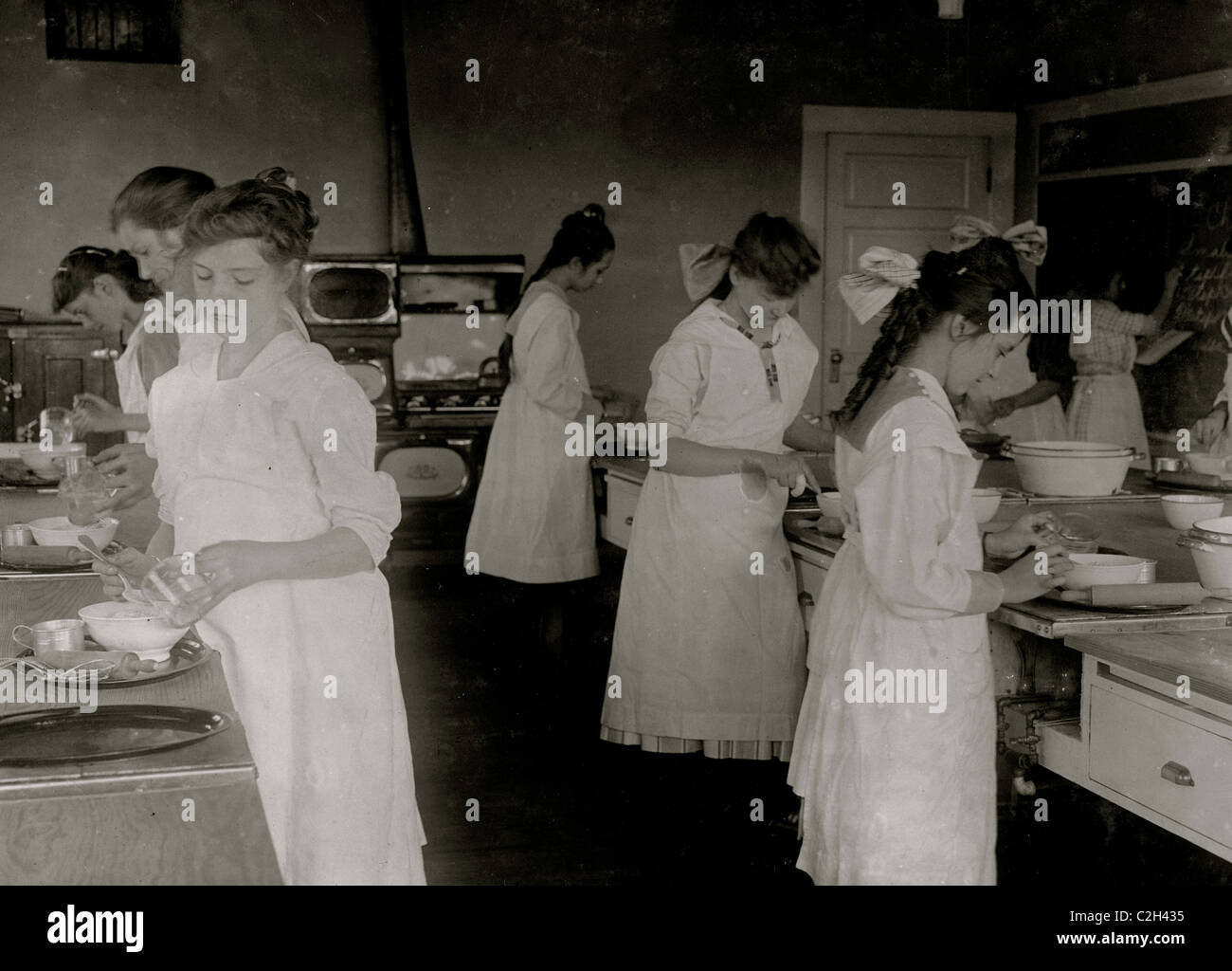 Domestic Science class in Horace Mann School. Stock Photo