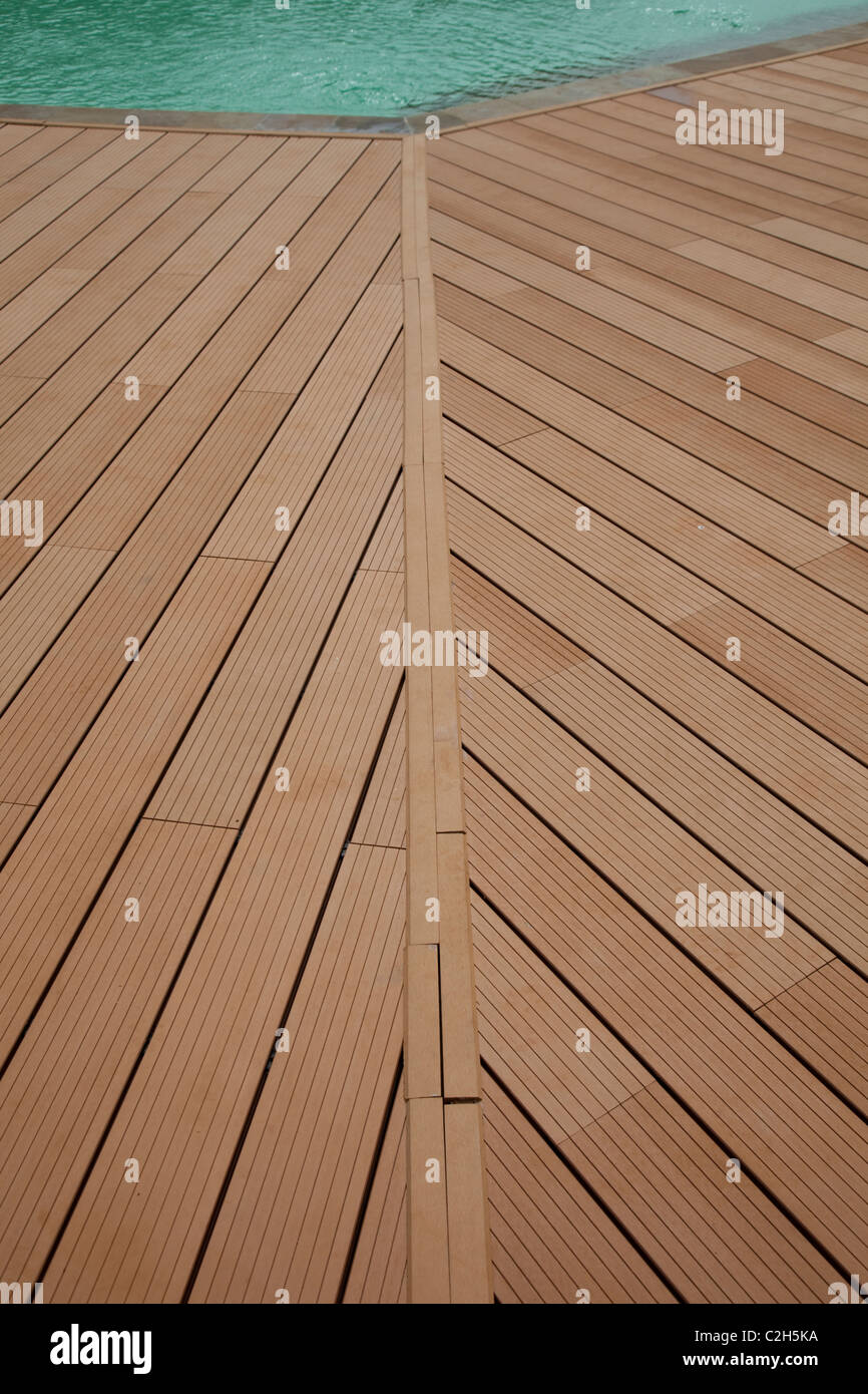 Decking platform around swimming pool made from recycled plastic Kenya