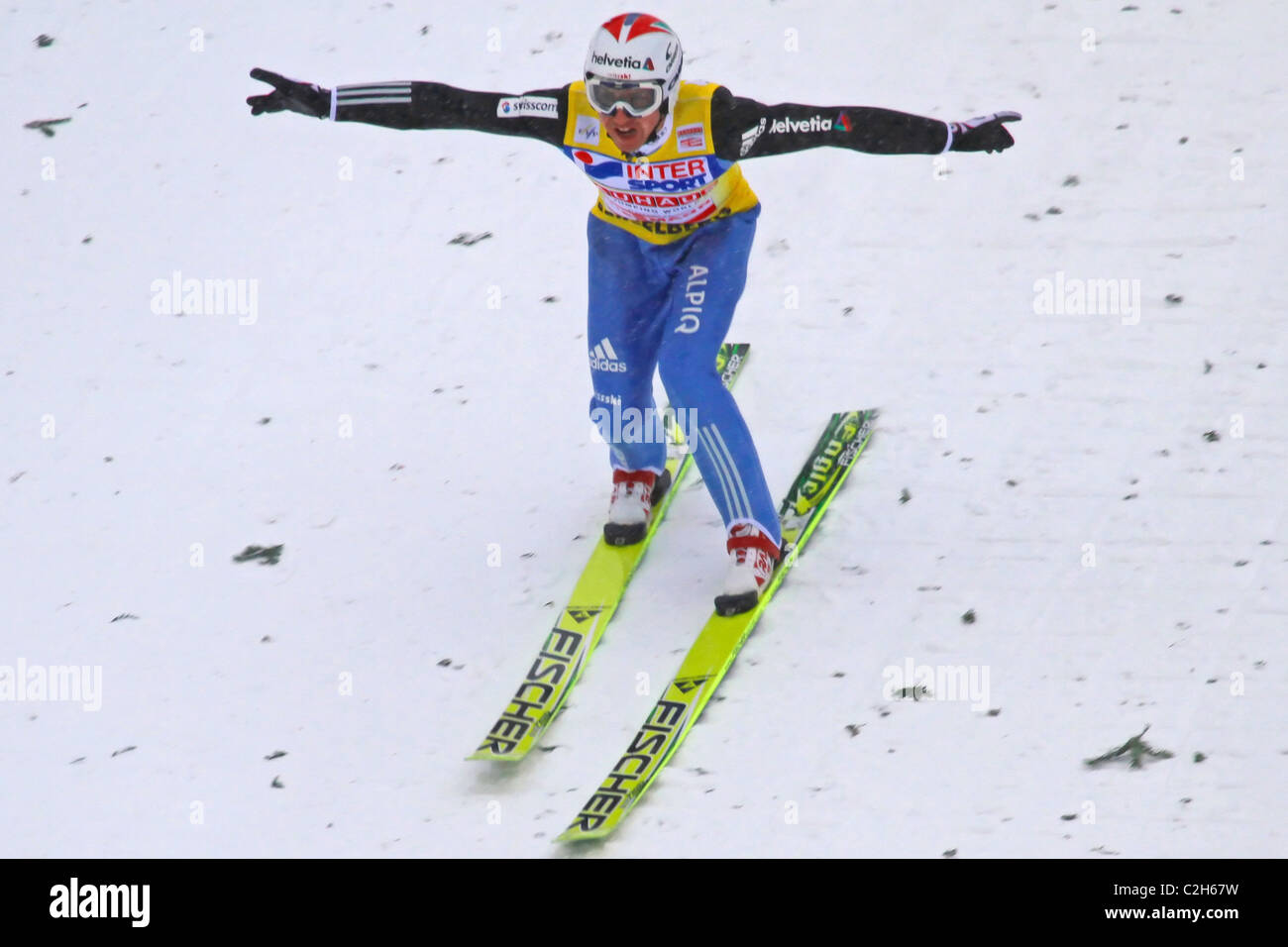 Ski jumper Simon Ammann lands safely at FIS World Cup December 19, 2009 in Engelberg SUI. He ended winning. Stock Photo