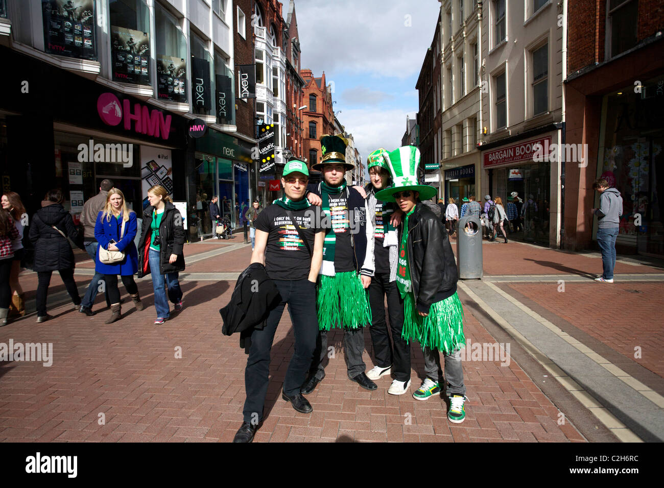 Visitors to the St Patricks Day parade and festival in Dublin, Ireland. Enjoying the 17th of March which is St Patricks Day celebrated every year Stock Photo