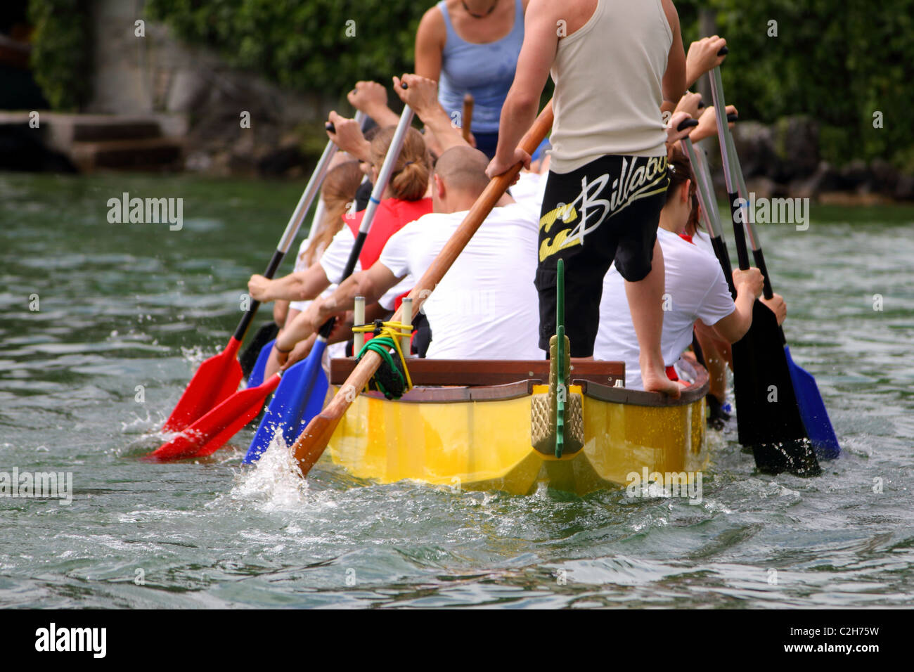 Athletes fought hard for victory and had fun at the dragen boat racing festival June 12, 2010 in Meilen, Switzerland. Stock Photo