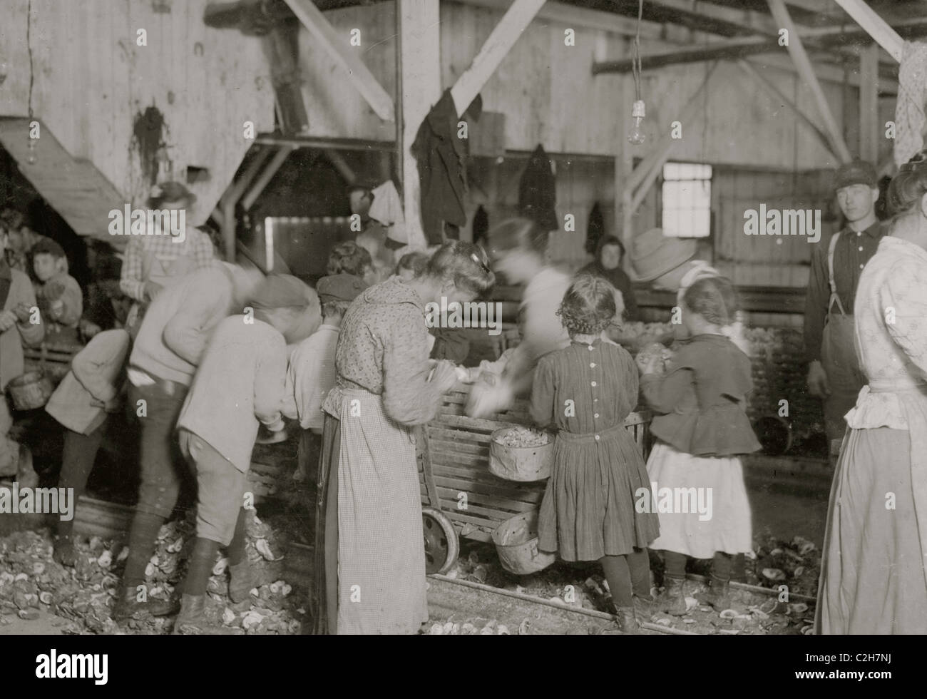 Jewish oyster shuckers in Barataria Canning Co. In this group are