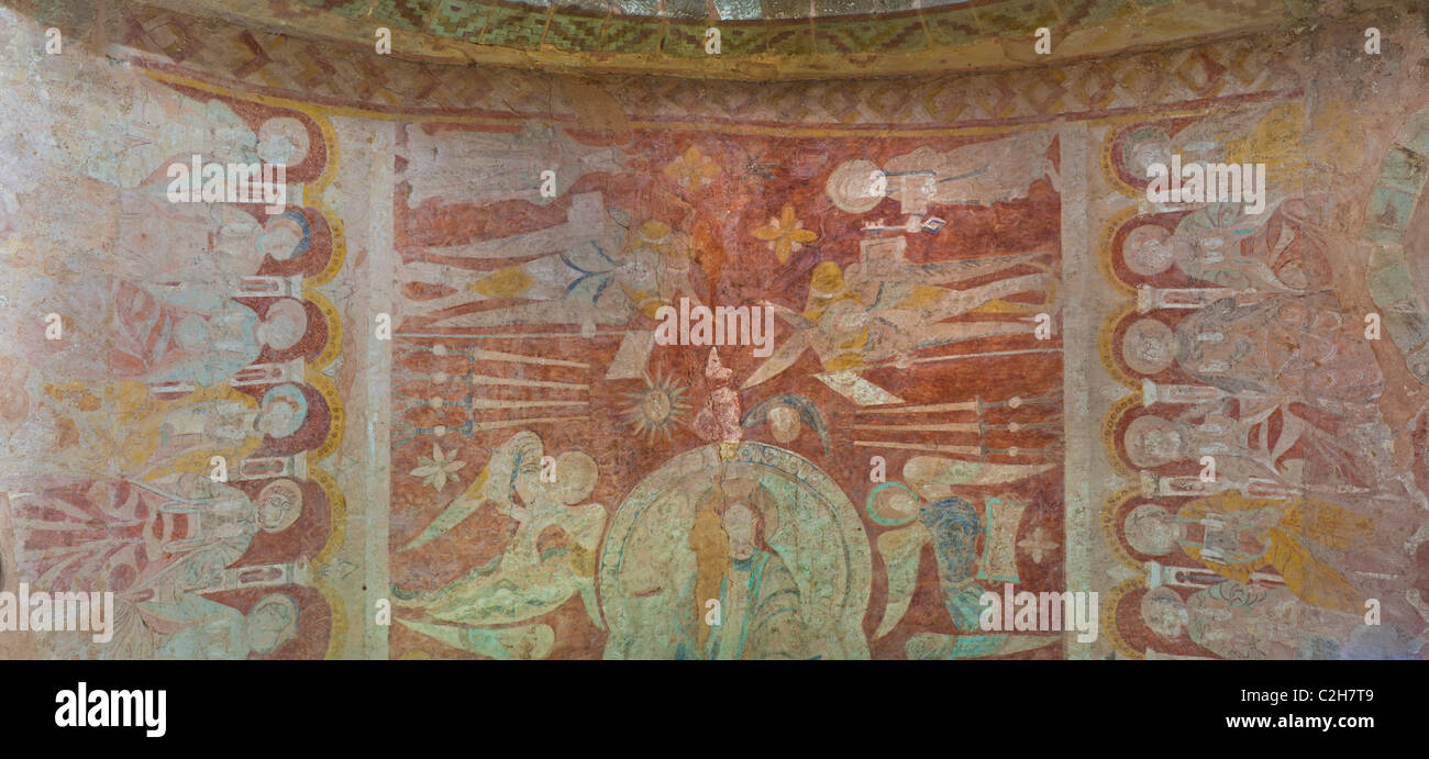 Fresco wall painting of Christ sitting on a rainbow on the ceiling of the chancel of St Marys church, Kempley, Gloucestershire Stock Photo