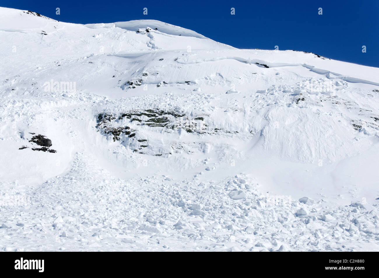 Windslab avalanche and debris in the Haute Maurienne, French Alps. Stock Photo