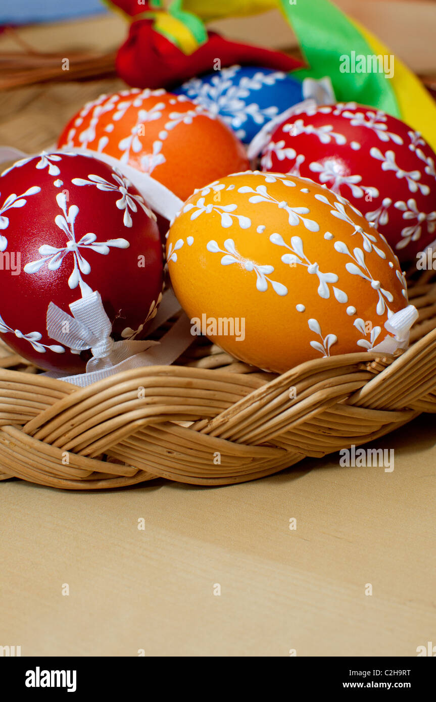 Color Painted Easter Eggs in the Basket Stock Photo - Alamy