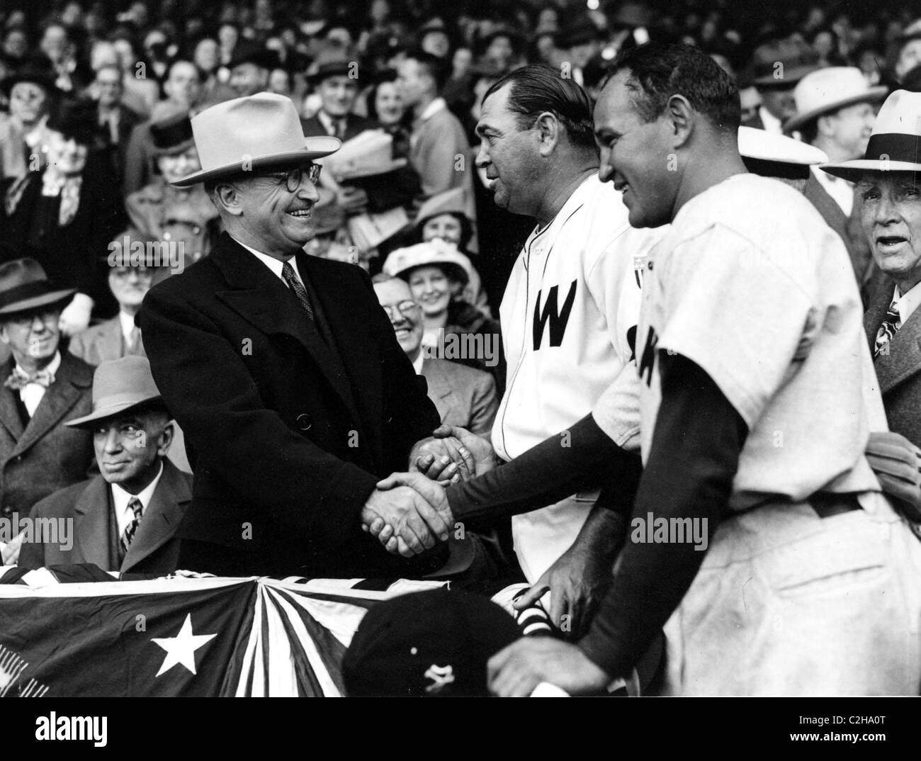 President Harry Truman Shakes hands with Players Stock Photo