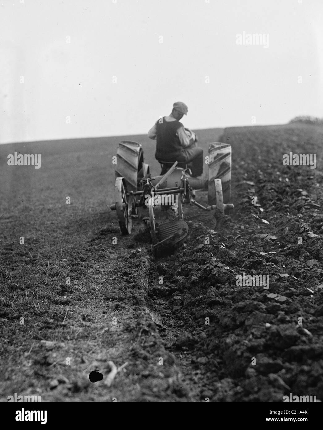 Ford Tractor plowing field Stock Photo Alamy